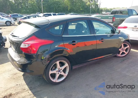 2014 Ford Focus Titanium z USA, uszkodzony, nr VIN 1FADP3N26EL458386